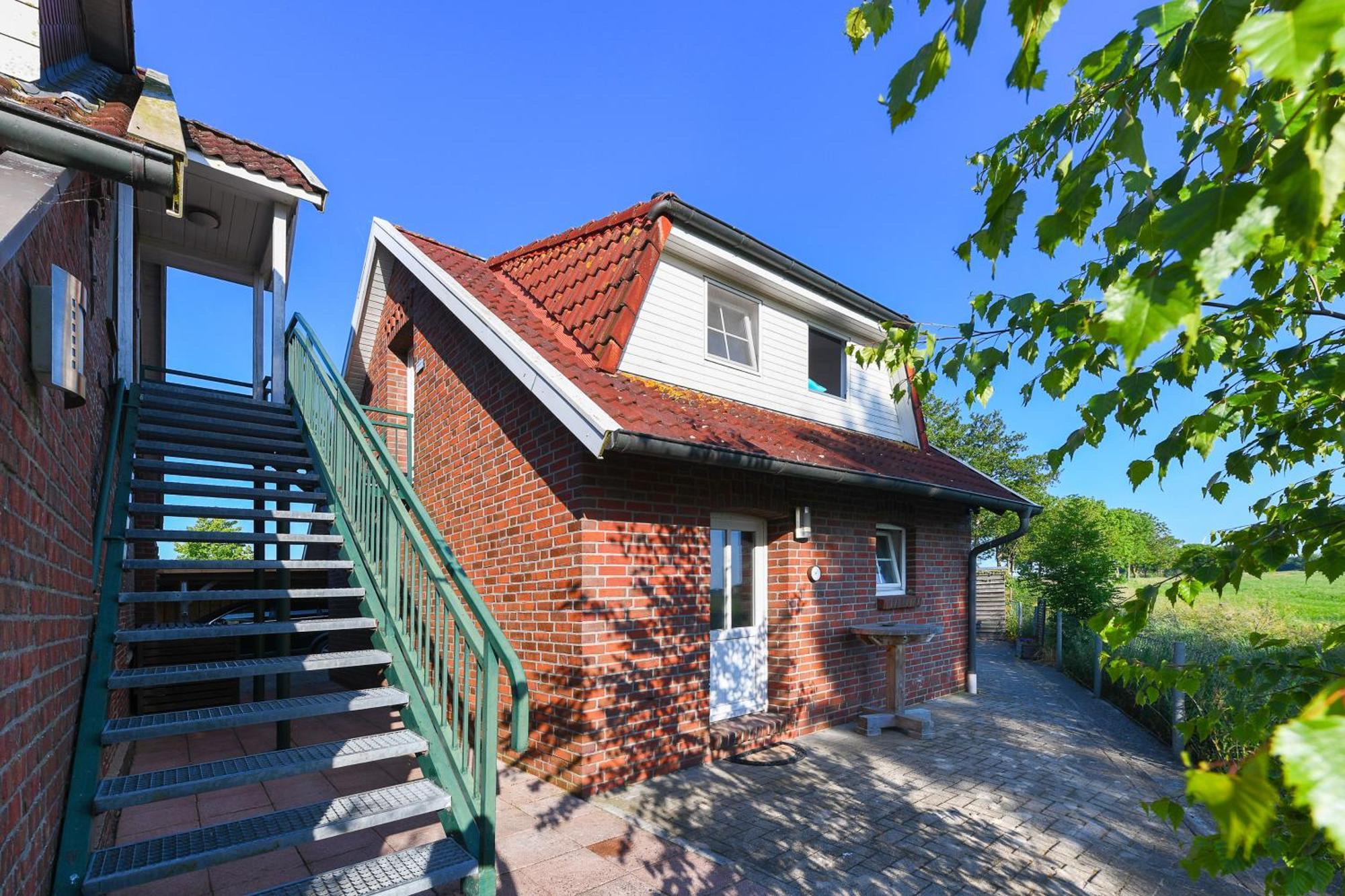 Ferienwohnungen Im Haus Friesische Weite Schillig Exteriör bild
